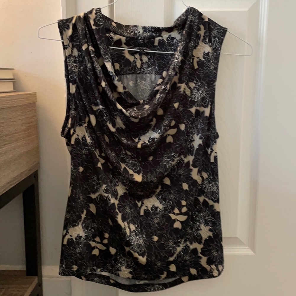 Sleeveless floral top.
